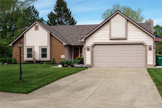 717 Walden Way, Dayton, OH 45440 - ranch-style house featuring concrete driveway, a chimney, a shingled roof, and a garage