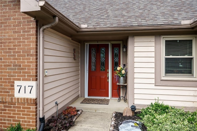 717 Walden Way, Dayton, OH 45440 - property entrance with a shingled roof