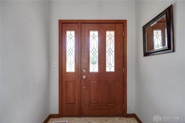 717 Walden Way, Dayton, OH 45440 - foyer with a wealth of natural light and baseboards