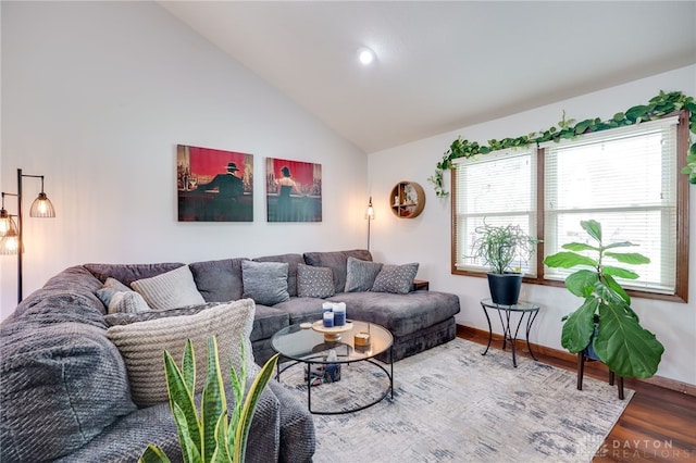 717 Walden Way, Dayton, OH 45440 - living area featuring baseboards, high vaulted ceiling, and wood finished floors