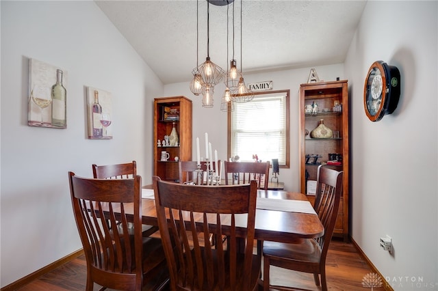 717 Walden Way, Dayton, OH 45440 - dining room with an inviting chandelier, a textured ceiling, baseboards, and dark wood-style floors