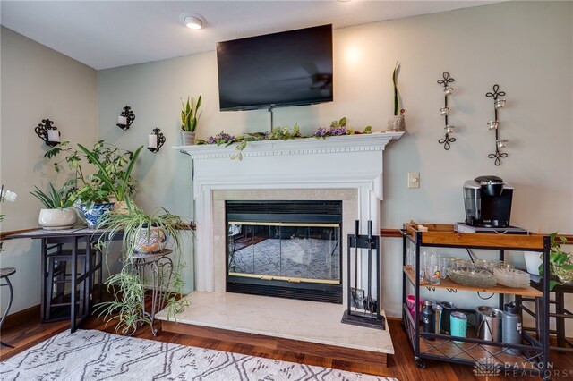 717 Walden Way, Dayton, OH 45440 - living area with a glass covered fireplace and wood finished floors