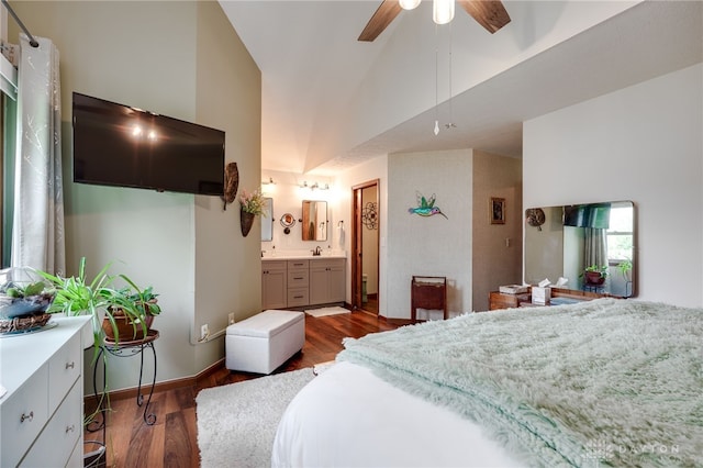 717 Walden Way, Dayton, OH 45440 - bedroom with lofted ceiling, connected bathroom, a ceiling fan, and wood finished floors