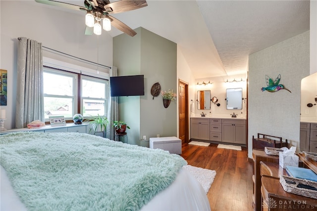 717 Walden Way, Dayton, OH 45440 - bedroom featuring connected bathroom, a sink, and dark wood-style floors