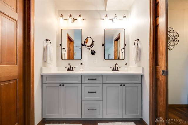 717 Walden Way, Dayton, OH 45440 - full bath featuring a sink, double vanity, and baseboards