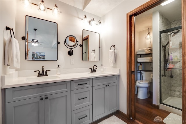 717 Walden Way, Dayton, OH 45440 - full bathroom with a sink, double vanity, a stall shower, and wood finished floors