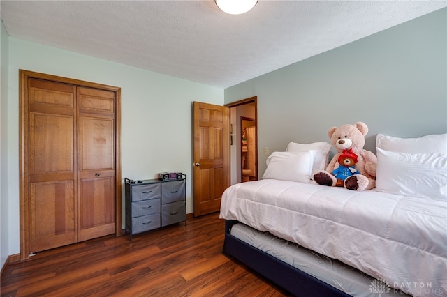 717 Walden Way, Dayton, OH 45440 - bedroom with a closet and dark wood finished floors