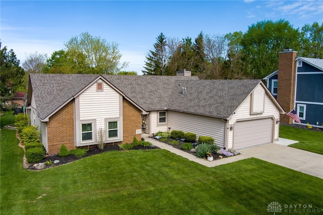 717 Walden Way, Dayton, OH 45440 - ranch-style home featuring brick siding, an attached garage, concrete driveway, a front yard, and roof with shingles