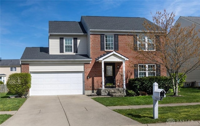 traditional-style house with brick siding, a front lawn, roof with shingles, and driveway