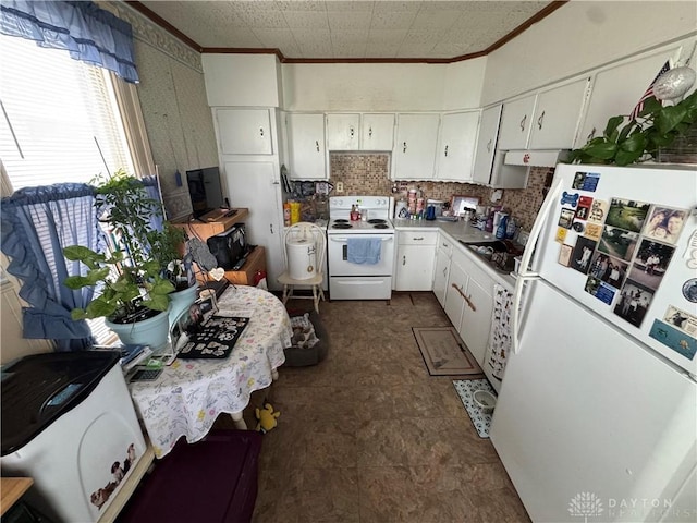 kitchen featuring ornamental molding, decorative backsplash, white appliances, and white cabinetry