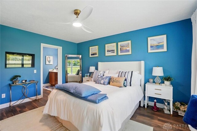 731 Waldsmith Way, Vandalia, OH 45377 - bedroom featuring wood finished floors, baseboards, a ceiling fan, and ensuite bath