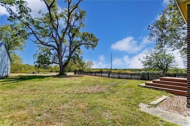 view of yard featuring fence