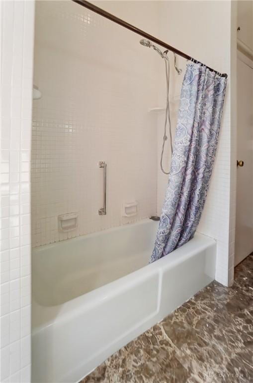 bathroom featuring shower / bathtub combination with curtain