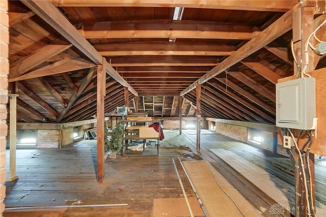 attic with electric panel