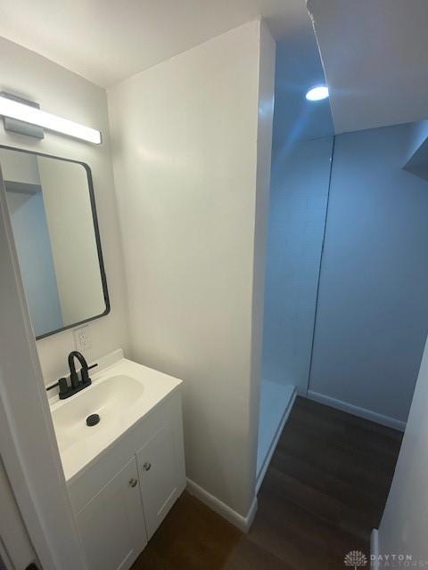 944 Wilmington Ave, Dayton, OH 45420 - bathroom featuring vanity and wood finished floors