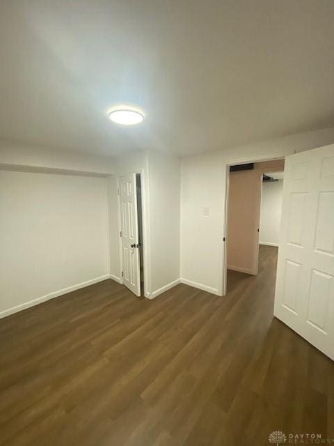 944 Wilmington Ave, Dayton, OH 45420 - unfurnished bedroom with dark wood-style floors and baseboards