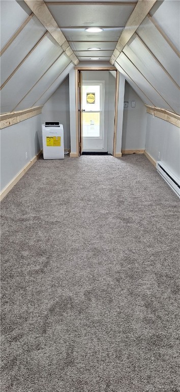 131 Hamilton St, West Milton, OH 45383 - additional living space with lofted ceiling, baseboards, baseboard heating, and carpet floors