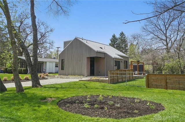 view of outdoor structure with fence