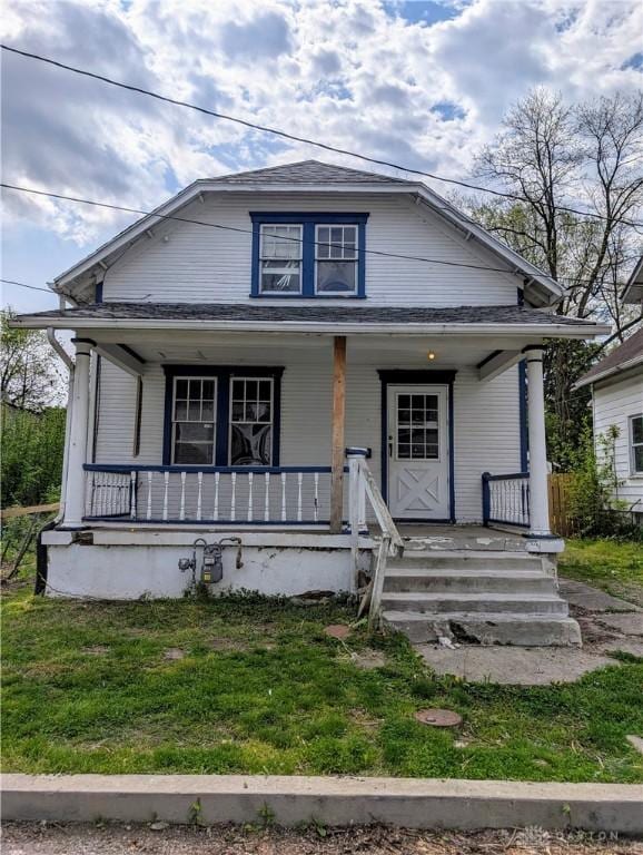 bungalow-style home with a porch