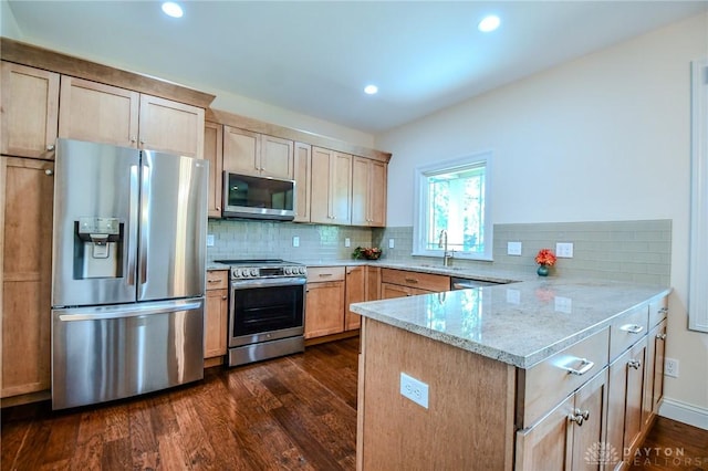 2725 Terraceview Cir, Beavercreek, OH 45431 - kitchen featuring stainless steel appliances, a peninsula, dark wood finished floors, decorative backsplash, and recessed lighting