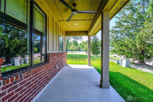 2725 Terraceview Cir, Beavercreek, OH 45431 - covered porch with ceiling fan and a lawn