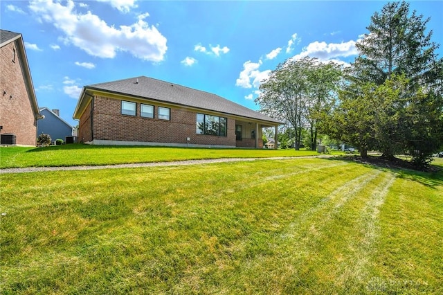 2725 Terraceview Cir, Beavercreek, OH 45431 - back of property featuring brick siding and a lawn
