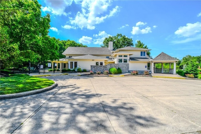 2725 Terraceview Cir, Beavercreek, OH 45431 - view of front of property featuring a chimney and uncovered parking