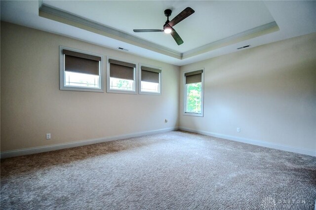 2725 Terraceview Cir, Beavercreek, OH 45431 - carpeted empty room with a tray ceiling, ceiling fan, and crown molding