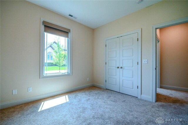 2725 Terraceview Cir, Beavercreek, OH 45431 - unfurnished bedroom with carpet and a closet