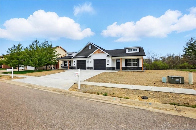 2061 Pine Forest Dr, Miamisburg, OH 45342 - craftsman house with a garage, a porch, and driveway