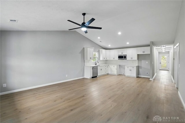 2061 Pine Forest Dr, Miamisburg, OH 45342 - unfurnished living room with light wood-style floors, a ceiling fan, baseboards, recessed lighting, and visible vents