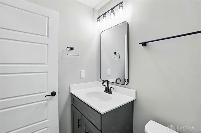 2061 Pine Forest Dr, Miamisburg, OH 45342 - bathroom featuring toilet and vanity