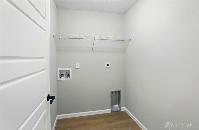 2061 Pine Forest Dr, Miamisburg, OH 45342 - laundry area featuring washer hookup, laundry area, electric dryer hookup, wood finished floors, and baseboards