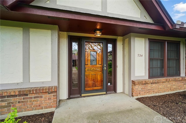 734 Pine Needles Dr, Washington Twp, OH 45458 - property entrance with brick siding