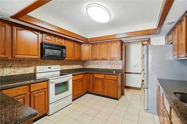 734 Pine Needles Dr, Washington Twp, OH 45458 - kitchen with brown cabinetry, black microwave, white electric range, a textured ceiling, and tasteful backsplash