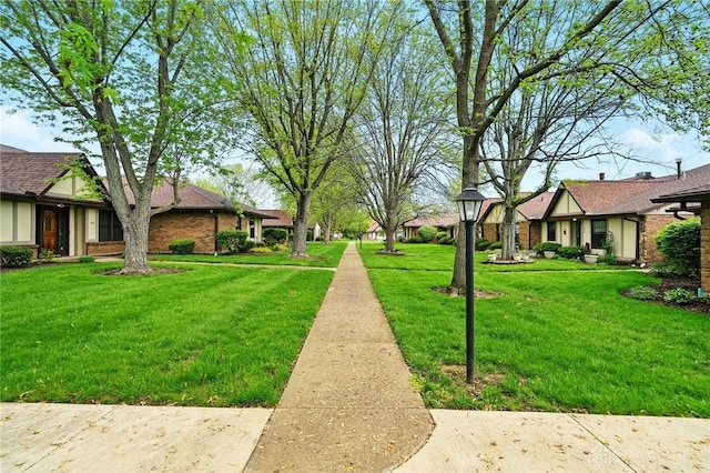 734 Pine Needles Dr, Washington Twp, OH 45458 - view of property's community featuring a yard and a residential view
