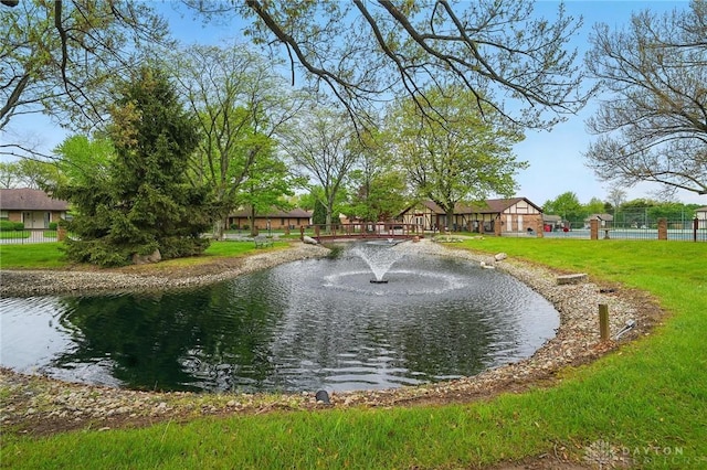 734 Pine Needles Dr, Washington Twp, OH 45458 - property view of water featuring fence