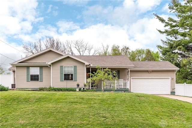 ranch-style home with fence, a garage, a porch, a front yard, and concrete driveway