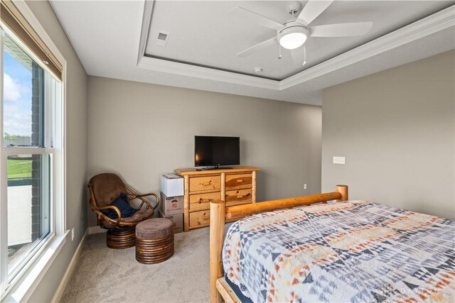 838 W Bentley Cir, Troy, OH 45373 - bedroom featuring light colored carpet, a raised ceiling, visible vents, and multiple windows