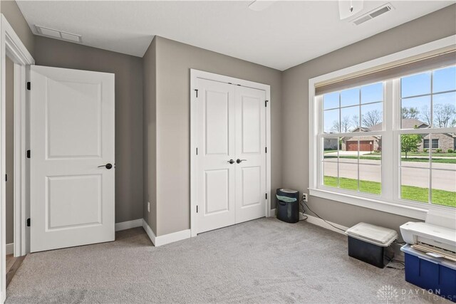 838 W Bentley Cir, Troy, OH 45373 - bedroom featuring baseboards, visible vents, and carpet
