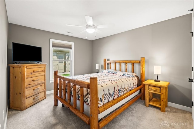 838 W Bentley Cir, Troy, OH 45373 - carpeted bedroom with a ceiling fan, baseboards, and visible vents