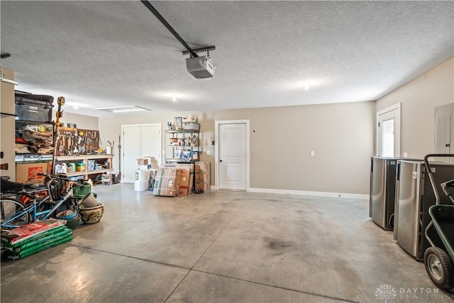 838 W Bentley Cir, Troy, OH 45373 - garage with baseboards and a garage door opener
