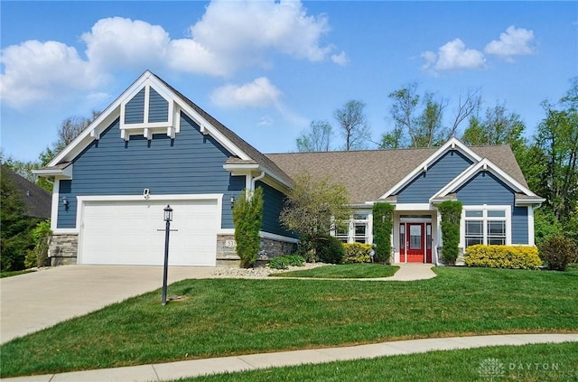craftsman inspired home with stone siding, an attached garage, driveway, and a front yard