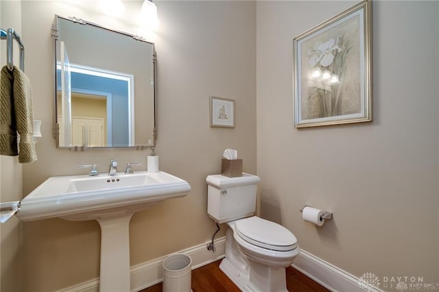835 Vintage Green Way, Centerville, OH 45458 - bathroom featuring baseboards, toilet, a sink, and wood finished floors