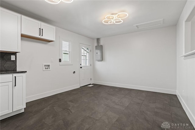 149 Poe Ln, Xenia, OH 45385 - interior space featuring baseboards, electric panel, and attic access