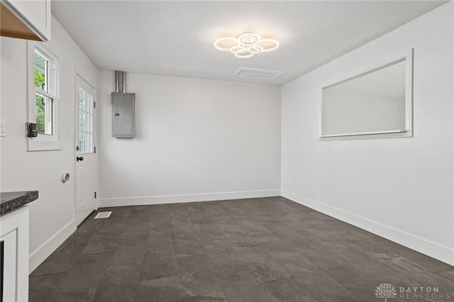 149 Poe Ln, Xenia, OH 45385 - unfurnished room featuring baseboards, visible vents, and electric panel