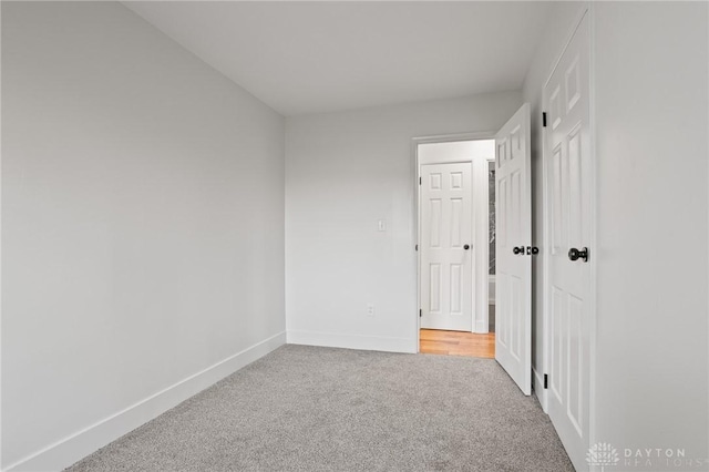 149 Poe Ln, Xenia, OH 45385 - spare room featuring baseboards and carpet