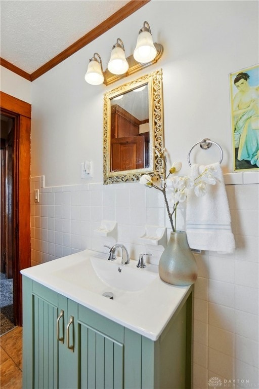 281 S Riverview Ave, Miamisburg, OH 45342 - bathroom with wainscoting, tile walls, ornamental molding, and vanity