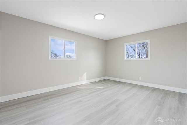 340 S Elm St, Dayton, OH 45449 - empty room with baseboards and light wood-style floors