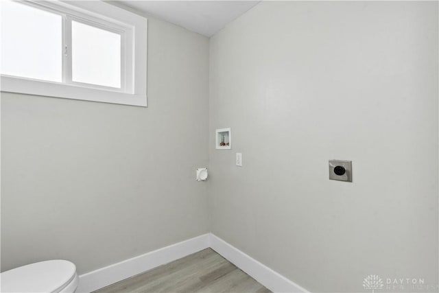 340 S Elm St, Dayton, OH 45449 - laundry room featuring washer hookup, hookup for an electric dryer, baseboards, and light wood-style floors
